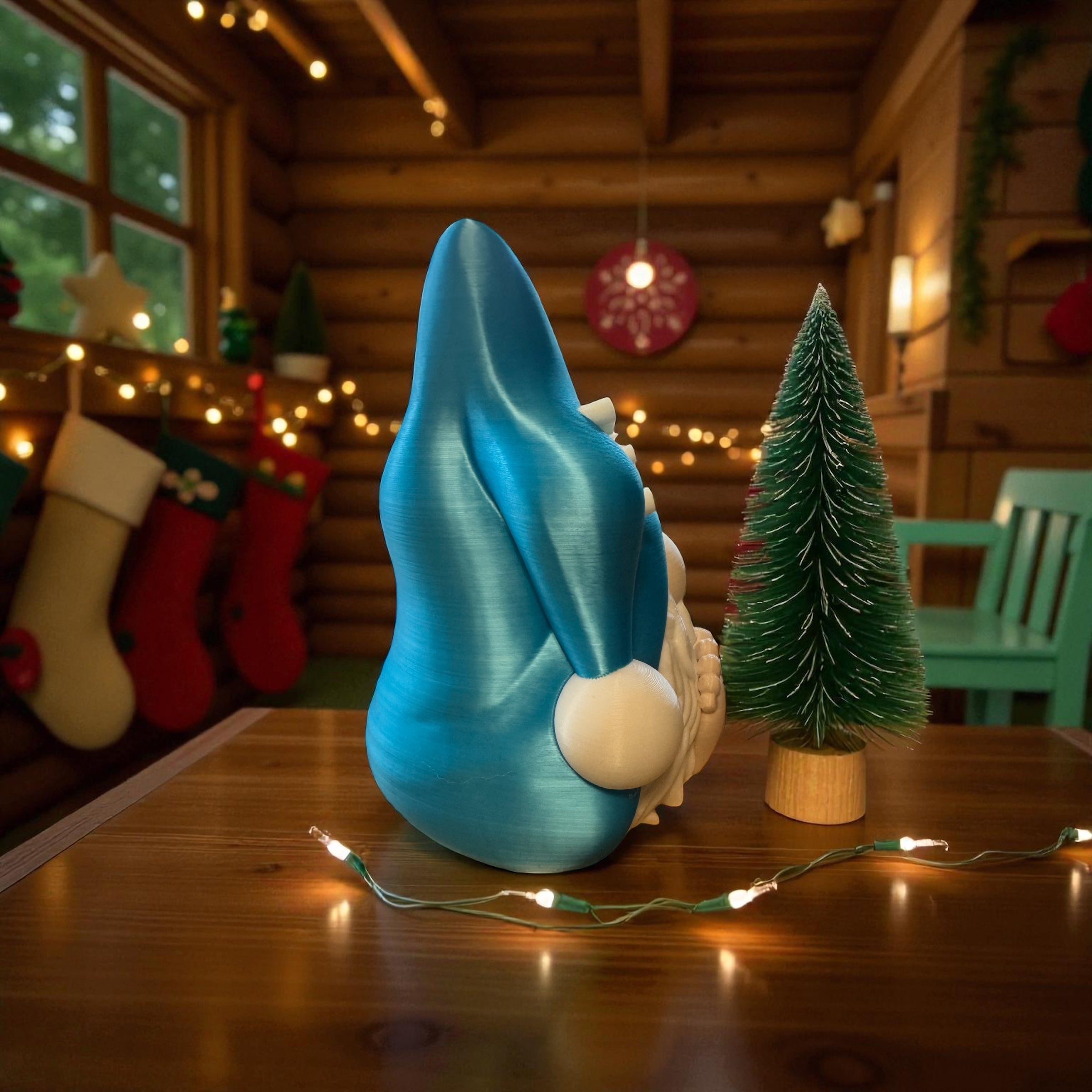 Blue gnome figure on a wooden table with Christmas decorations in the background