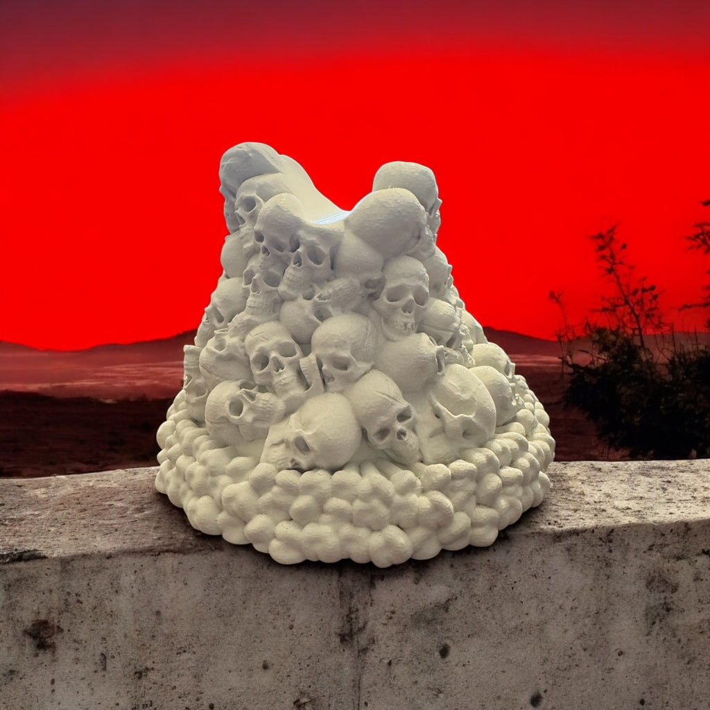 White pile of skulls on a stone ledge with a red sky