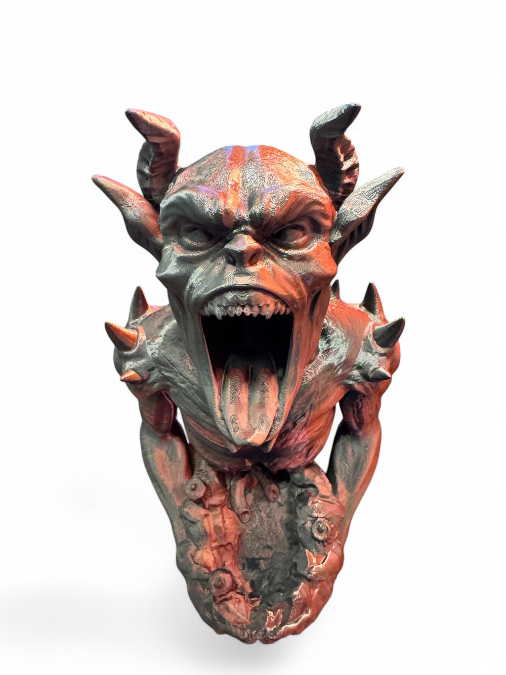 An imp shaped dice tower mouth wide open on a white background.